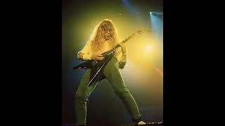 HOW does Dave Mustaine sing and play this?