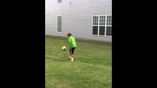 Kid does bicycle Kick