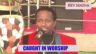 CAUGHT IN WORSHIP...REV JAMES MAINA