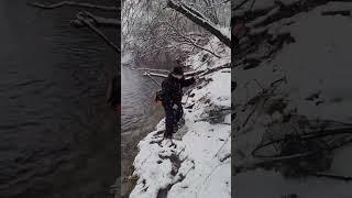 catching big brown trout after a snowstorm