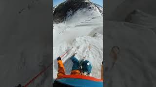 Spicy cliff drop on skis!