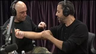 Joe Rogan puts spike through David Blaine's arm