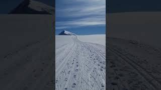 Perfect Winter Day To Hike On A Snow-clad Mountain