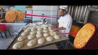 Hardworking Iranian man baking Tufton bread / Steps of baking Tufton bread / Bakery in Iran