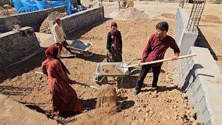 completion of foundation excavation; hardworking nomadic family