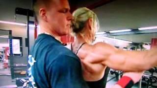 Swedish female bodybuilder working out in the gym
