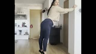 Standing Girl Farts in Blue Jeans Pant