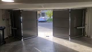 Bi-Fold Garage Doors - automatic and trackless, quiet and smooth. @themotorisedgatecompany1571