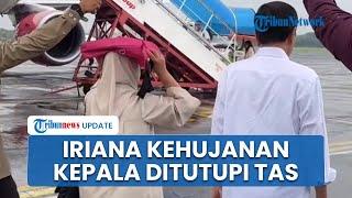 Pulang ke Solo Bareng Jokowi Naik Batik Air, Iriana Kehujanan sampai Kepala Ditutupi Tas