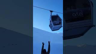 Ascending to winter wonderland heights! ️️ #Gondola #SnowyPeaks #MountainMagic #travelmodeon