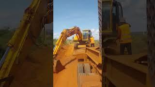 loading excavator on lowbed