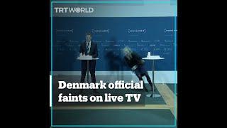 Denmark official faints during Covid-19 conference