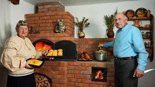 Happy old age of an elderly couple in the village / Christmas Eve