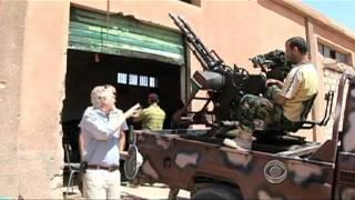 Anti-Qaddafi rebels struggle, persevere