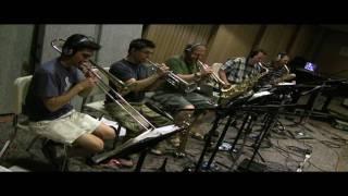 Fat City Horns record "Pack it Up" in the studio.