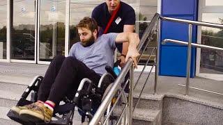 Man Helping Disabled Person Stock Video