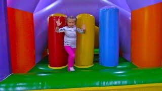 Yasya plays on the playground with inflatable trampolines Funny Kids Vlog