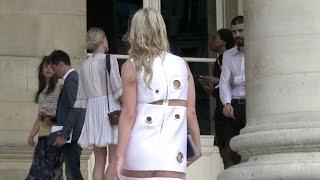 Nicky Hilton shows her bum in a  see through dress while attending Versace Haute Couture Show