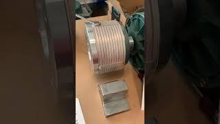 (Liberty Engine #2) Laminated Disk Rotor Utilizing Metal Disks to Change Composition