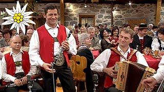 Austrian TV show host sings with his audience for good health