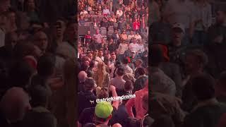 Sean Strickland fighting Dricus Du Plessis in UFC 296 crowd