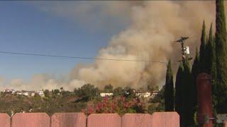 Fast-moving brush fire in College Area of San Diego forces evacuations and damages homes