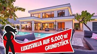 Luxusvilla auf 5.000 qm Grundstück von Luxhaus | Hausbau Helden