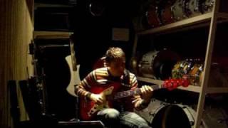 Will Karling plays Jaguar fender bass Hot Rod Red