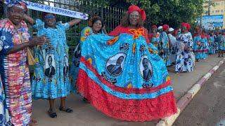 Supporters greet Cameroonian President Biya's convoy upon his return from abroad | AFP