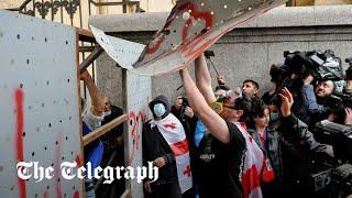 Violent protests outside Georgian parliament as ‘foreign agents bill’ approved