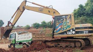 Excavator  Cat 312 Loading Trucks With Two Passes   Labrianidis Mining Works