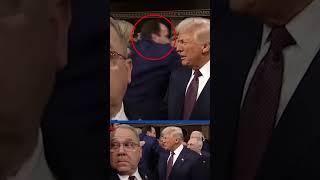 Protesting Democrat has sign ripped from her hands