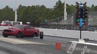 Mustang GT Loses Control Drag Racing BMW M5 - Road Test TV ®