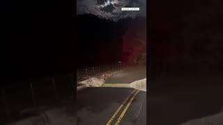 Intense Flooding Triggers Road Collapse In Stony Brook, New York