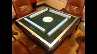 Automatic Mahjong Table In China:  Mixing Tiles Requires No Hands