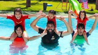 The whole family in the pool