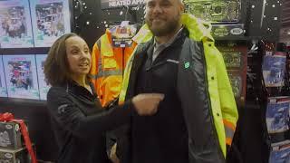 Parts manager, Maria shows off Trux Accessories display at Jerr-Dan Booth