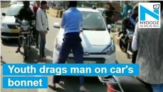 Man drags cabdriver for two kilometres on car's bonnet