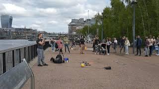 Juggling fire sticks and ball together | street Artist | London