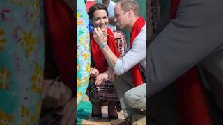 Prince William breaks open a coconut on a stone in Kaziranga National Park, India  in 2016.
