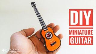 Diy miniature guitar from cardboard | cardboard craft |ayan mazid craft | craft vedio|paper craft