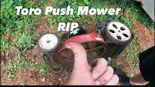 Out For The Trash Toro Push Mower Bound For the Metal Yard