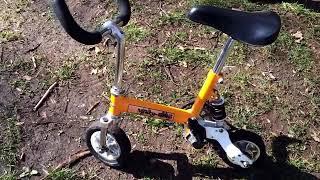 orange Mikro bike mini bike monkey bike