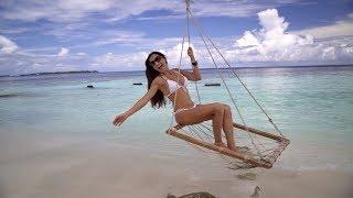 Holiday dreams at maledives vilamendhoo island resort with beautiful girl