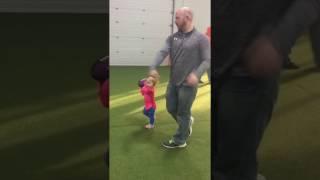 Playing football with daddy at Good Times Park