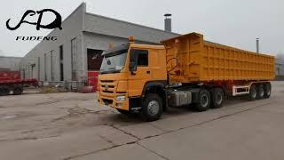 Sinotruck howo truck head & Tipper semi trailer make test - tipper semi trailer finished production