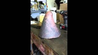 Raising A Phrygian Helmet