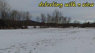 Metal detecting with the equinox 800 in the snow. December hunt, 1800's property, coins and relics