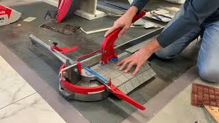 Cutting 1 cm thick porcelain mosaic with a manual tile cutter