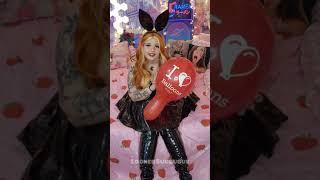lil latex bunny babe blowing up a balloon